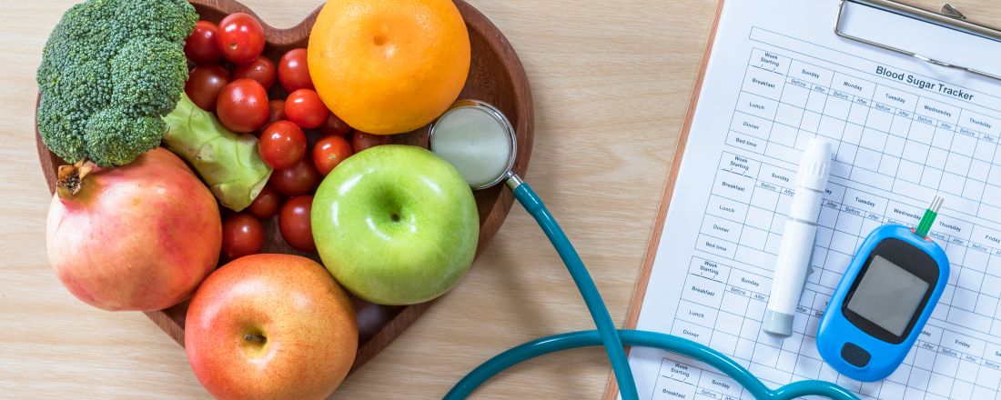 healthy food together with a set-up for measuring blood sugar